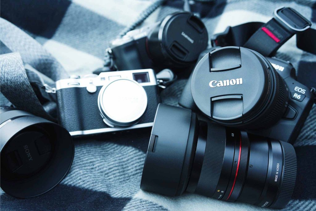A battered lens, snagged by buying used gear on GearFocus, catches a client’s portrait in golden light—proof pre-owned gear delivers pro-grade magic without the price.