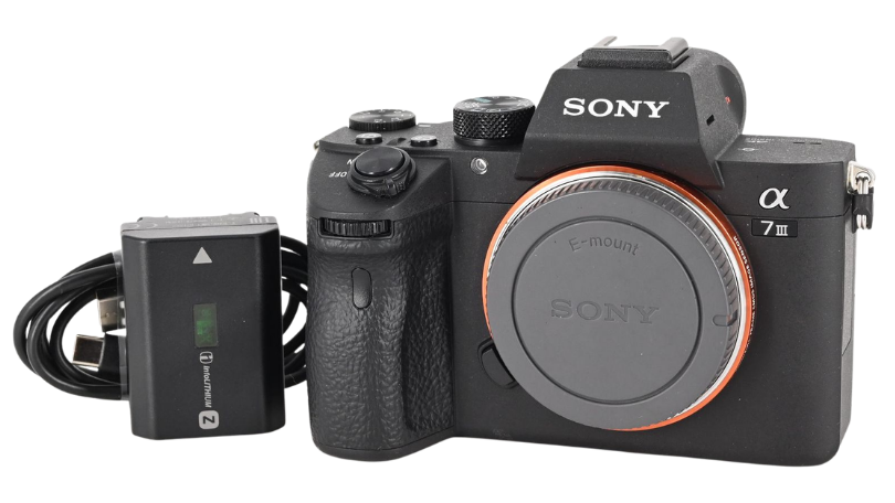 Used Sony a7 III full-frame mirrorless camera body with battery and cable — how photographers are documenting the 2025 cultural moment with pro-grade dynamic range and eye-tracking autofocus, available used from verified sellers on GearFocus for under $1,500.