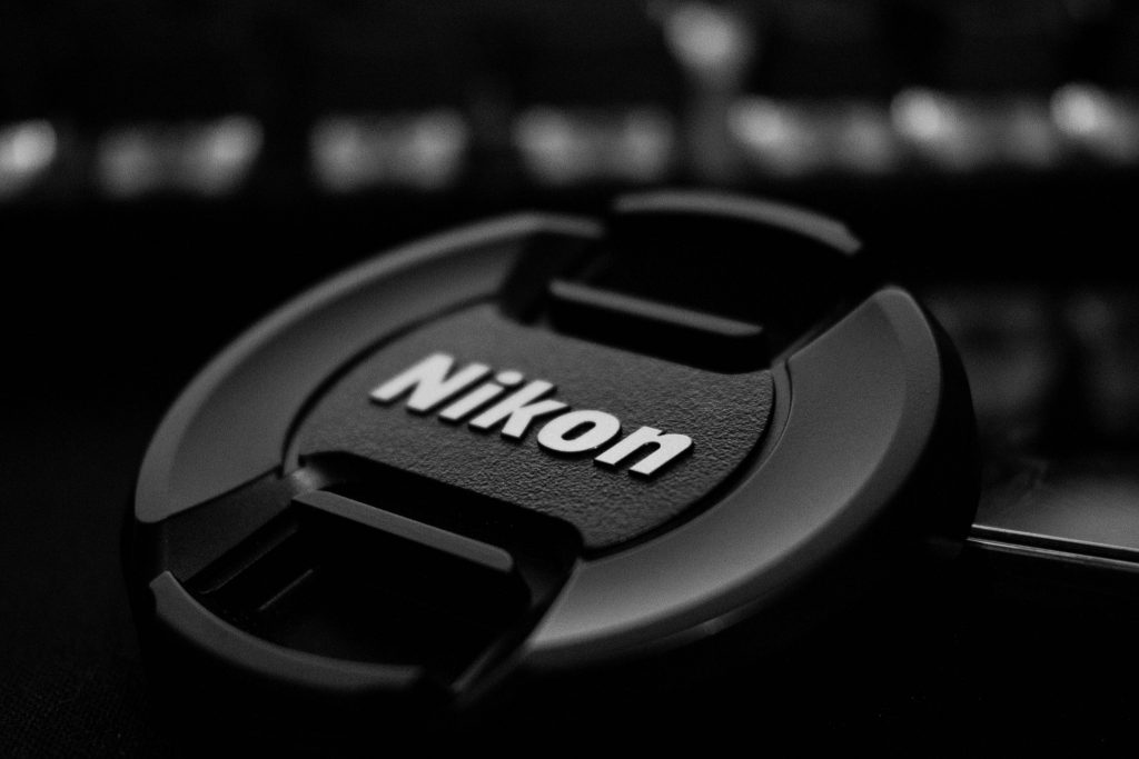 Nikon lens cap close-up — Nikon bought RED Digital Cinema in 2024